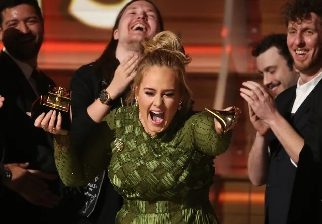 Adele breaks the Grammy for Record of the Year for “Hello” after having it presented to her at the 59th Annual Grammy Awards in Los Angeles, California, U.S., February 12, 2017. (Photo by Lucy Nicholson/Reuters)