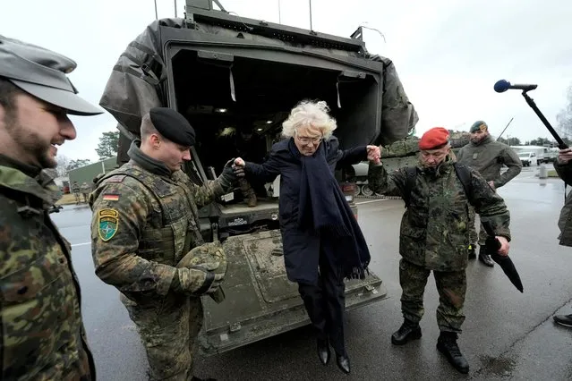 German Defence Minister Christine Lambrecht meets German soldiers as she visits Rukla military base, Lithuania on December 19, 2021. (Photo by Ints Kalnins/Reuters)