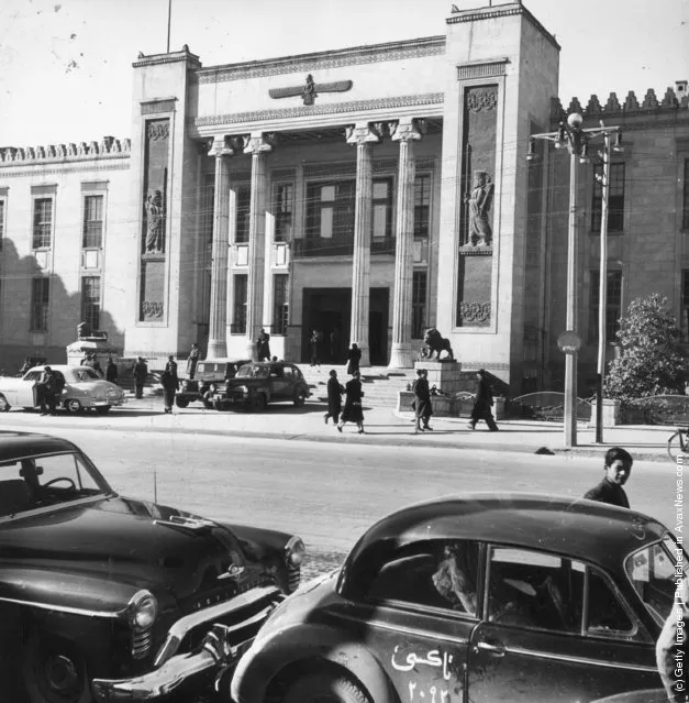 1955:  The Melli bank which is the centre of foreign commerce in Teheran, Persia. The architecture is modern though the relief figures on the front are of ancient Persians