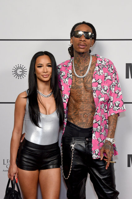 American rapper Wiz Khalifa and girlfriend  Aimee Aguilar attend Big Game Kick-Off Event, hosted by Jay Glazer, Merging Vets And Players, at Academy LA on February 09, 2022 in Los Angeles, California. (Photo by Vivien Killilea/Getty Images)