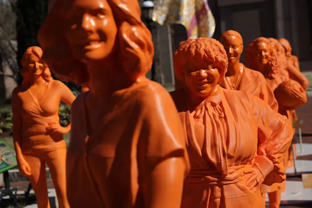 Life-size 3D-printed statues honoring women in STEM are seen at the Enid A. Haupt Garden outside the Smithsonian Castle March 4, 2022 in Washington, DC. The Smithsonian presents “#IfThenSheCan – The Exhibit,” a collection of 120 statues of women in STEM (science, technology, engineering, mathematics) which will be on display in Smithsonian gardens and in and around select Smithsonian museums March 5–27, to commemorate the Women’s History Month. (Photo by Alex Wong/Getty Images)