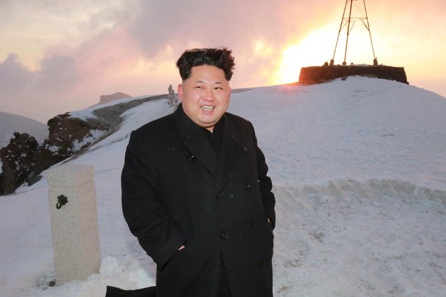 North Korean leader Kim Jong Un views the dawn from the summit of Mt Paektu April 18, 2015, in this photo released by North Korea's Korean Central News Agency (KCNA) on April 19, 2015. (Photo by Reuters/KCNA)