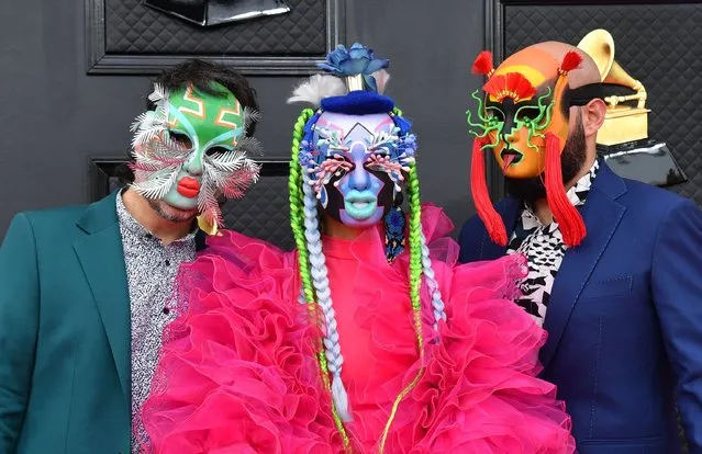 Colombian band Bomba Estereo arrives for the 64th Annual Grammy Awards at the MGM Grand Garden Arena in Las Vegas on April 3, 2022. (Photo by Angela  Weiss/AFP Photo)