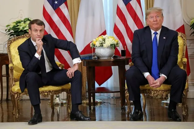 U.S. President Donald Trump meets with France's President Emmanuel Macron, ahead of the NATO summit in Watford, in London, Britain, December 3, 2019. (Photo by Ludovic Marin/Pool via Reuters)