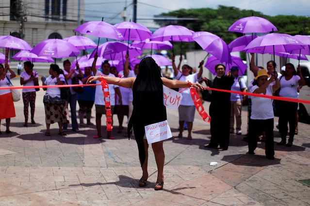 Women participate in a protest to commemorate international s*x workers day in San Salvador, El Salvador, June 2, 2016. (Photo by Jose Cabezas/Reuters)