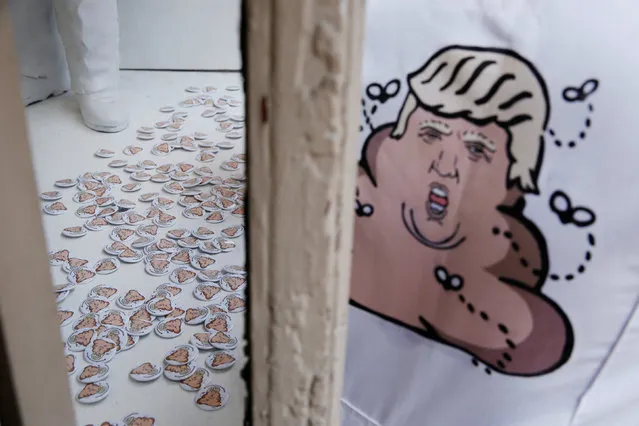 Buttons and the back of painting overalls are displayed in a temporary store selling artwork that references U.S. Republican presidential candidate Donald Trump made by the artist Hanksy in New York, U.S., June 4, 2016. (Photo by Lucas Jackson/Reuters)