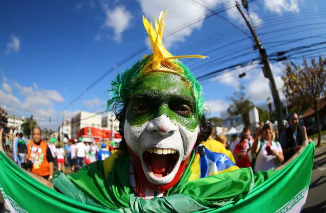 Fans of Iran during the 2014 FIFA World Cup Brazil Group F match between Iran and Nigeria at Arena da Baixada on June 16, 2014 in Curitiba, Brazil. (Photo by Amin Mohammad Jamali/Getty Images)