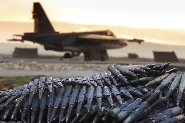 In this file photo taken on Friday, December 18, 2015 provided by the Russian Defense Ministry Press Service, a load of ammunition is prepared to be loaded on to Russian war planes at Hemeimeem air base in Syria. Russia claimed Friday, June 16, 2017 it killed the leader of the Islamic State group in an airstrike on a meeting of IS leaders just outside the IS de facto capital in Syria. The Russian Defense Ministry said Abu Bakr al-Baghdadi was killed in a Russian strike in late May along with other senior group commanders. (Photo by Vadim Savitsky/Russian Defense Ministry Press Service via AP Photo)