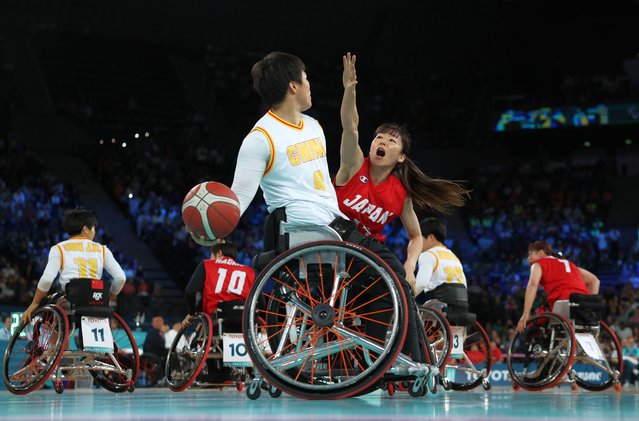 Guidi Lyu of Team People’s Republic of China in possession whilst under pressure from Chinami Shimizu of Team Japan during the Women's Quarter Final Game 30 between Team People’s Republic of China and Team Japan on day seven of the Paris 2024 Summer Paralympic Games at Bercy Arena on September 04, 2024 in Paris, France. (Photo by Steph Chambers/Getty Images)