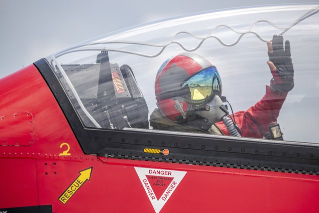 A pilot in the Indonesian Air Force aerobatics team Jupiter gestures during the first day of the Bali International Air Show in Bali, Indonesia, 18 September 2024. The Bali International Air Show runs at Ngurah Rai International Airport from 18 to 21 September 2024. (Photo by Made Nagi/EPA/EFE)
