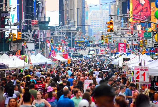 Thousands gather for seasons last flea market at Times Square in New York City on August 27, 2022. (Photo by Ryan Rahman/Pacific Press/Rex Features/Shutterstock)