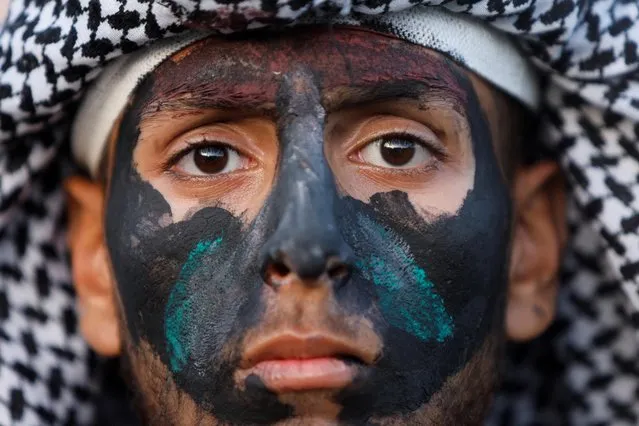 Palestinians Hamas supporters take part in an anti-Israel rally over tension in Jerusalem's Al-Aqsa mosque, in Gaza City on October 1, 2022. (Photo by Mohammed Salem/Reuters)