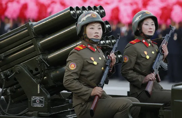 North Korean soldiers parade through Kim Il Sung Square with their missiles and rockets during a mass military parade, Saturday, October 10, 2015, in Pyongyang, North Korea. (Photo by Wong Maye-E/AP Photo)