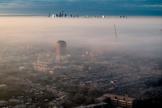 Fog hangs over the east of the capital on a frosty Sunday morning on January 12, 2025 in London, UK. (Photo by David Levene/The Guardian)