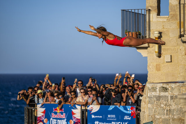 In this handout image provided by Red Bull, Kaylea Arnett of the USA dives from the 20 metre balcony during the first competition day of the second stop of the Red Bull Cliff Diving World Series on June 28, 2025 at Polignano a Mare, Italy. (Photo by Dean Treml/Red Bull via Getty Images)