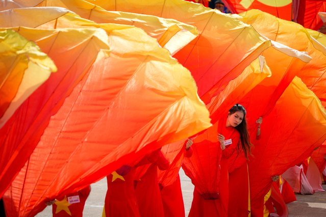 Performers take part in a parade celebrating the 80th anniversary of independence in Hanoi, Vietnam, on September 2, 2025. (Photo by Vincent Thian/Pool via Reuters)