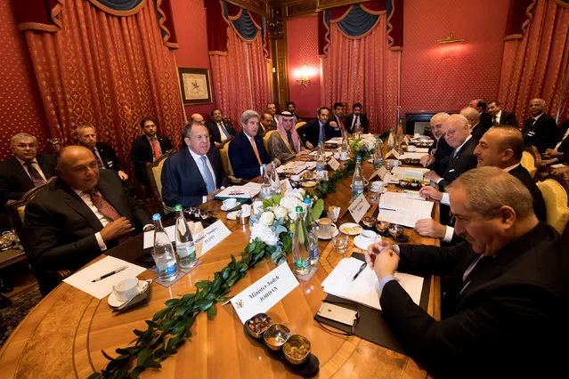 (From L-R), Egypt's Foreign Minister Sameh Shoukry, Russia's Foreign Minister Sergei Lavrov, U.S. Secretary of State John Kerry, Saudi Arabia's Foreign Minister Adel al-Jubeir, Qatar's Foreign Minister Sheikh Mohammed bin Abdulrahman al-Thani, Iraq's Foreign Minister Ibrahim al-Jaafari, Iran's Foreign Minister Mohammad Javad Zarif, Staffan de Mistura, UN Special Envoy of the Secretary-General for Syria, Turkey's Foreign Affairs Minister Mevlut Cavusoglu, Jordan's Foreign Minister Nasser Judeh, speak together around a table during a bilateral meeting where they discussed the crisis in Syria, in Lausanne, Switzerland, October 15, 2016. (Photo by Jean-Christophe Bott/Reuters)