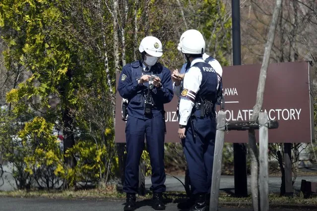Police officers stand guard near the venue of the G7 Foreign Ministers' Meeting Sunday, April 16, 2023, in Karuizawa, a resort town north of Tokyo. (Photo by Eugene Hoshiko/Pool via AP Photo)