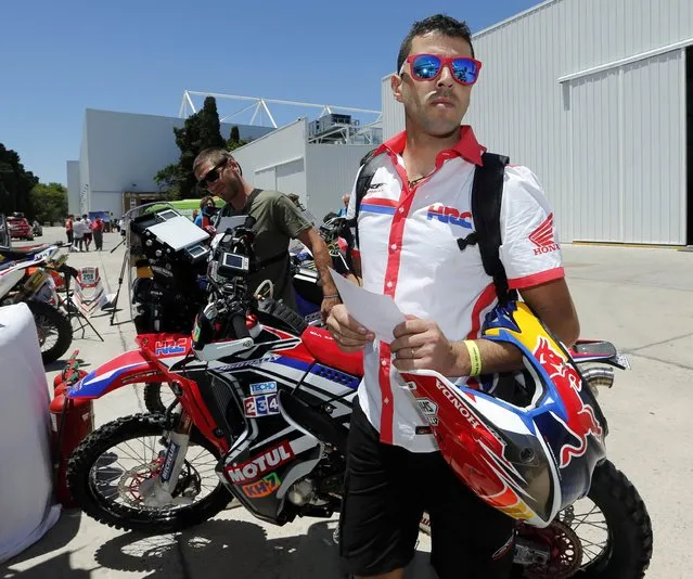 Honda rider Joan Barreda Bort of Spain arrives for technical verification ahead of the Dakar Rally 2015 in Buenos Aires January 2, 2015. (Photo by Enrique Marcarian/Reuters)