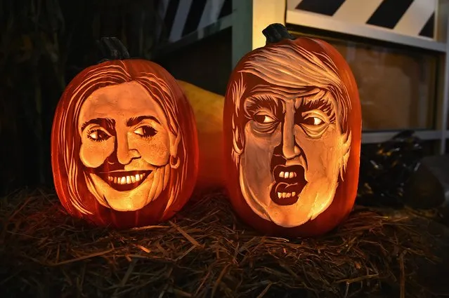 Master Carver Hugh McMahon Creates Giant Donald Trump And Hillary Clinton Pumpkin at Chelsea Market on October 28, 2016 in New York City. (Photo by Theo Wargo/Getty Images)