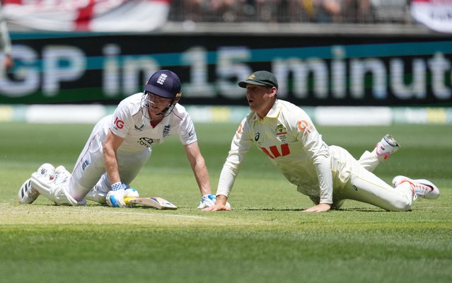 Australia's Marnus Labuschagne attempts to run out England's Harry Brook on November 21, 2025. (Photo by Asanka Brendon Ratnayake/Reuters)