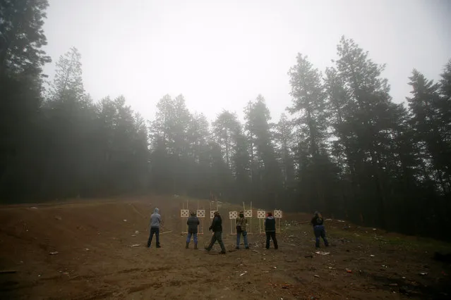 Participants take a firearms handling and safety class that was open to the public in Grants Pass, Oregon, U.S. March 26, 2016. (Photo by Jim Urquhart/Reuters)
