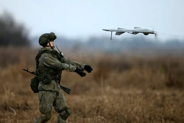 A Russian soldier launches a drone during a joint Serbian-Russian military training exercise “Slavic Brotherhood” in the town of Kovin, near Belgrade, Serbia November 7, 2016. (Photo by Marko Djurica/Reuters)