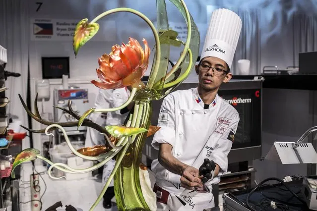 Rizalino Manas of The Philippines competes during the Pastries World Cup final on January 25, 2015 as part of the Catering and Food International Show (SIRHA) in Chassieu, outside Lyon. (Photo by Jean-Philippe Ksiazek/AFP Photo)