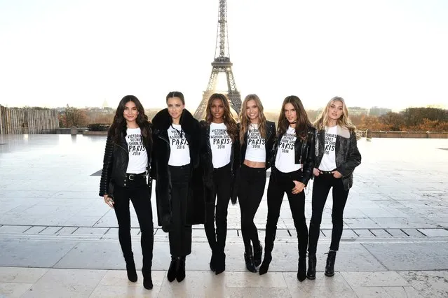 (L-R) Lily Aldridge,Adriana Lima, Jasmine Tookes, Josephine Skriver, Alessandra Ambrosio and Elsa Hosk pose in front of the Eiffel Tower prior the 2016 Victoria's Secret Fashion Show on November 29, 2016 in Paris, France. (Photo by Dimitrios Kambouris/Getty Images for Victoria's Secret)