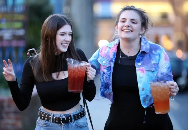 Ladies enjoy a drink in Liverpool, northwest England as Covid-19 lockdown restrictions ease across the country on May 17, 2021. (Photo by Nb press ltd)