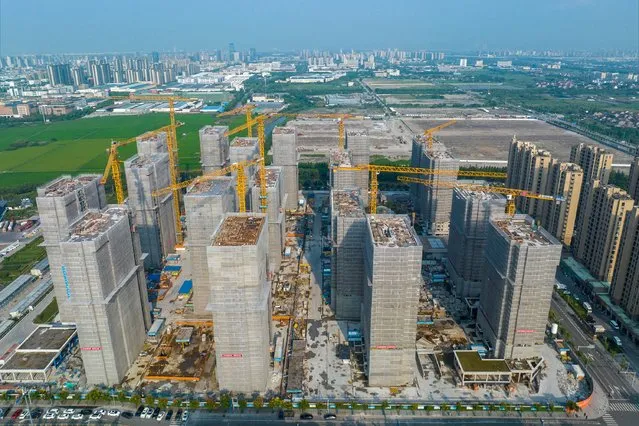 An aerial photo taken on September 17, 2023 shows residential buildings under construction in Ningbo, in China's eastern Zhejiang province. (Photo by AFP Photo/China Stringer Network)