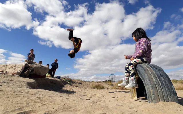 Children play at a park in Baikonur, Kazakhstan, 07 October 2018. Baikonur is the location of the Russian leased Baikonur cosmodrome. (Photo by Yuri Kochetkov/EPA/EFE)