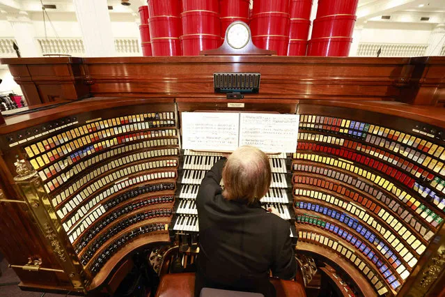 Organist Peter Richard Conte celebrates the holiday season while playing holiday classics on the Wanamaker Organ, the world's largest playing pipe organ with 28,575 pipes, on Monday, November 21, 2022 in Philadelphia, PA. Free concerts can be enjoyed Monday through Saturday at 12 and 5:30 p.m. in the Grand Court at Macy's Center City. (Photo by Jason E. Miczek/AP Images for Macy's, Inc.)