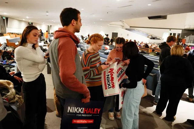 People participate in caucus day to choose a Republican presidential candidate, in Des Moines, Iowa, U.S. January 15, 2024. (Photo by Marco Bello/Reuters)