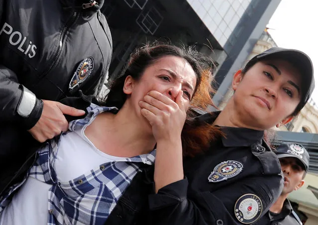 Police detain a protester after marching on Taksim Square to celebrate May Day in Istanbul, Turkey May 1, 2019. (Photo by Murad Sezer/Reuters)