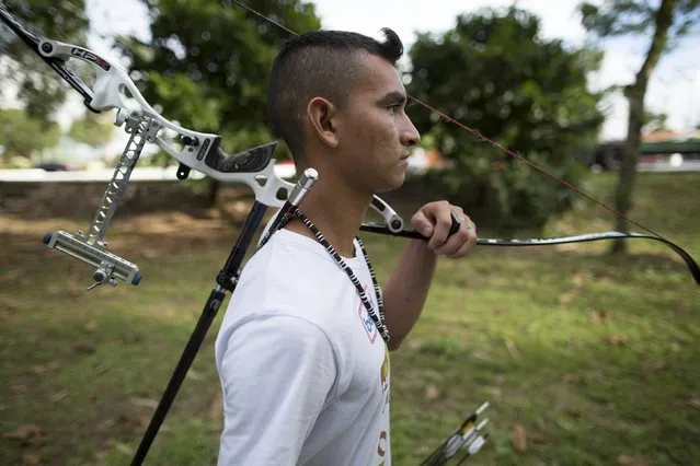 Kambeba Indian, Dream Braga, 18, walks at a training centre in Manaus, Amazon state May 7, 2015. (Photo by Bruno Kelly/Reuters)