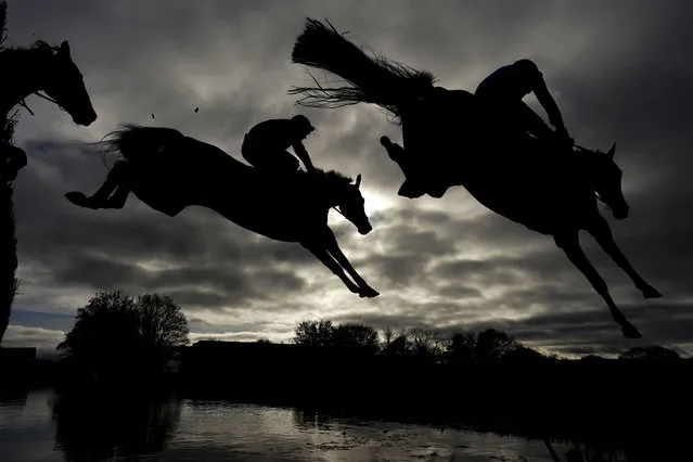 A general view as runners clear the water jump during The Wincanton Supporting Wincanton Town Youth FC Mares' Novices' Handicap Chase at Wincanton Racecourse on November 18, 2021 in Wincanton, England. (Photo by Alan Crowhurst/Getty Images)