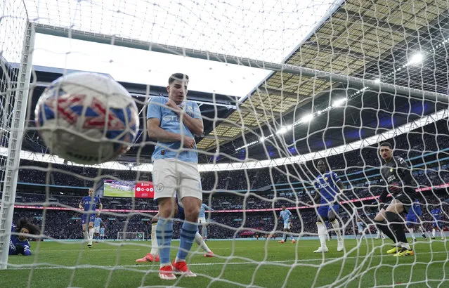 Manchester City's Bernardo Silva, not pictured, scores their side's first goal of the game during the English FA Cup semifinal soccer match between Manchester City and Chelsea at Wembley stadium in London, Saturday, April 20, 2024. (Photo by Adam Davy/PA Wire via AP Photo)