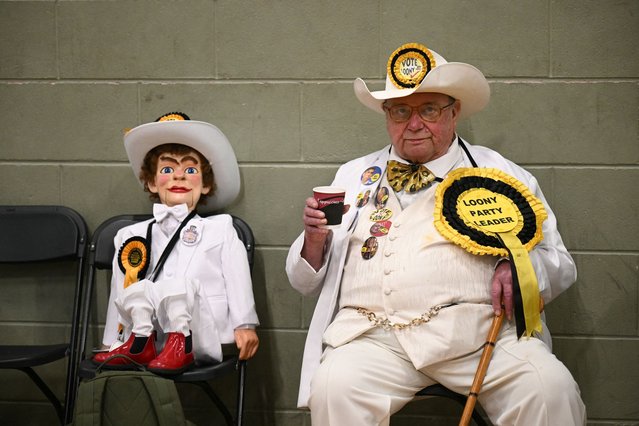 Monster Raving Loony candidate Howling Laud Hope (R) waits for the declaration at the count centre in Blackpool, north-west England on May 3, 2024, during the Blackpool South by-election. In line with other by-elections in recent years, Labour is expected to seize the Blackpool South parliamentary seat from the Tories after their MP resigned over a lobbying scandal. (Photo by Oli Scarff/AFP Photo)