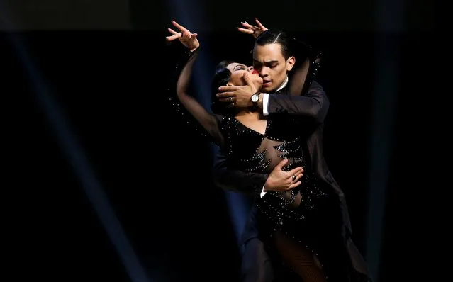 Juan David Vargas and Paulina Mejia, representing the city of Cali, Colombia, perform during the Stage style final round at the Tango World Championship in Buenos Aires, Argentina August 21, 2019. (Photo by Agustin Marcarian/Reuters)
