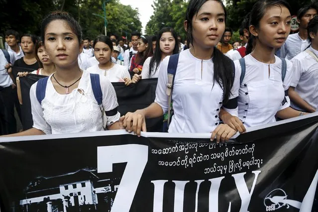 Demonstrators attend a protest led by students at Yangon University in Myanmar July 7, 2015. The students gathered in Yangon on Tuesday to mark the 53rd anniversary of the military's suppression of student protests in 1962, the same year when late General Ne Win seized power to usher in 49 years of authoritarian army rule in the former Burma. Dozens of students were killed when Ne Win's four-month-old junta crushed the 1962 demonstrations and used dynamite to blow up the students' union building of Yangon University. (Photo by Soe Zeya Tun/Reuters)