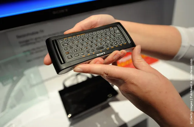 Updated Google TV remote with backlit keyboard is on the back on display at the Sony booth at the 2012 International Consumer Electronics Show