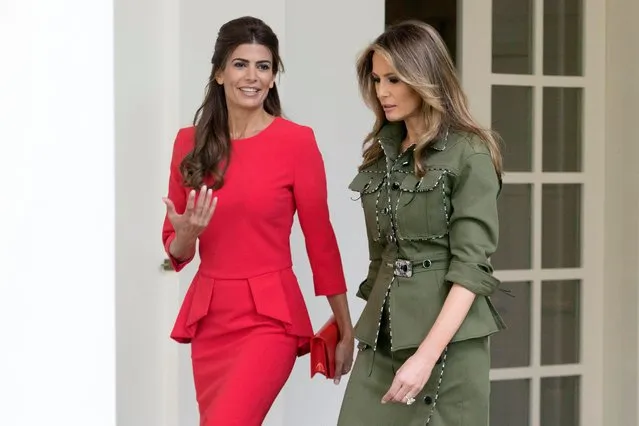 US First Lady Melania Trump (R) and Argentine First Lady Juliana Awada (L) walk together at the Colonnade of the White House in Washington, DC, USA, 27 April 2017. US President Donald J. Trump hosts President of Argentina Mauricio Macri at the White House. (Photo by Michael Reynolds/EPA)