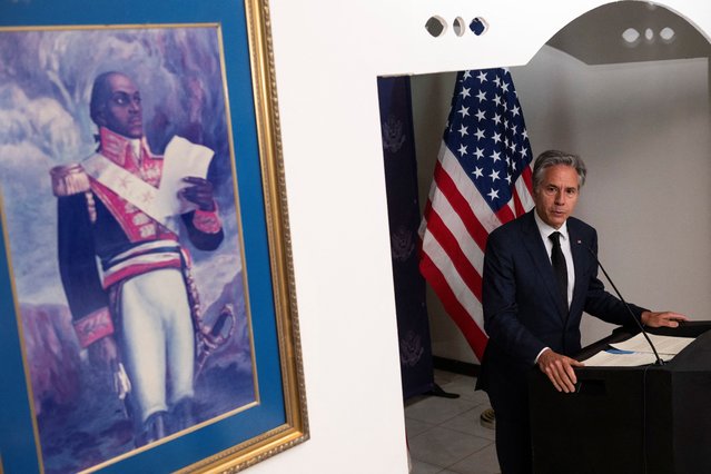 Secretary of State Antony Blinken speaks next to a painting of Toussaint Louverture the main leader of Haiti’s independence during a press conference at the end of his one day visit to Haiti at the Toussaint Louverture International Airport in Port Au Prince on September 05, 2024. Blinken is in violence-ravaged Haiti to evaluate progress in wresting control from gangs that have taken over much of the impoverished Caribbean nation. (Photo by Roberto Schmidt/AFP Photo)