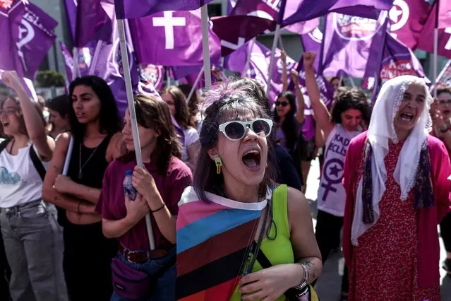 Supporters of “We'll Stop Femicide” Platform Association hold their flags and shouts slogans as they attend demonstration before the closure case against their association in front of the Istanbul Caglayan Court House, 01 June 2022. An Istanbul prosecutor had filed a lawsuit in April, accusing the platform of “activity against law and morals”. (Photo by Sedat Suna/EPA/EFE)