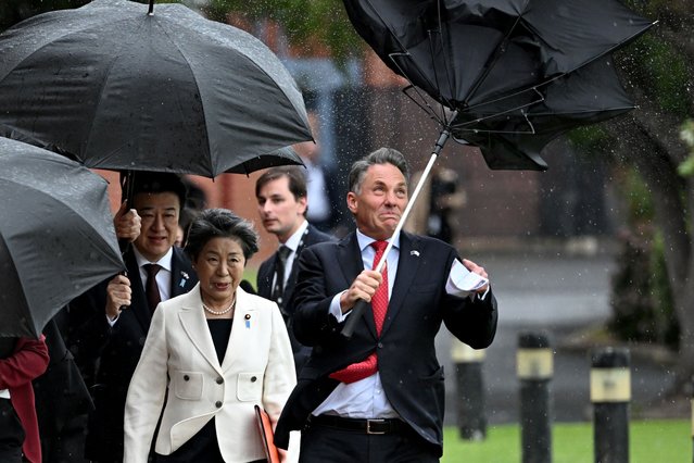 Japanese Foreign Affairs Minister Yoko Kamikawa walks next to Australian Deputy Prime Minister and Defence Minister Richard Marles as he struggles with his umbrella during 11th Australia-Japan 2+2 Foreign and Defence Ministerial Consultation at Fort Queenscliff in Queenscliff, Victoria, Thursday, September 5, 2024. (Photo by William West/AAP Image)