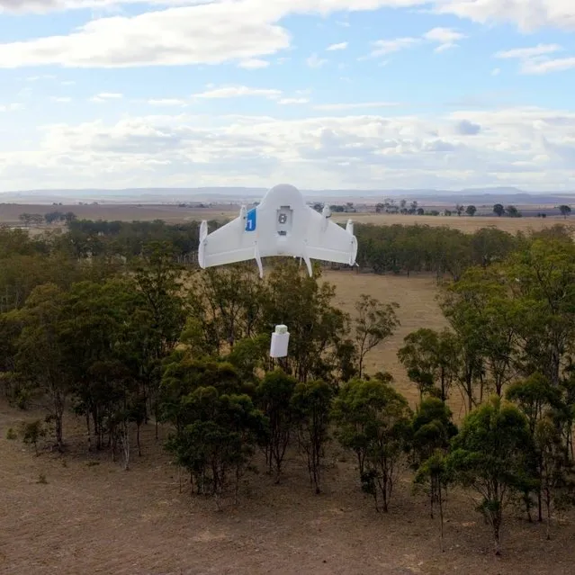 This undated image provided by Google shows a Project Wing drone vehicle during delivery. Google's secretive research laboratory is trying to build a fleet of drones designed to bypass earthbound traffic so packages can be delivered to people more quickly. (Photo by AP Photo/Google)