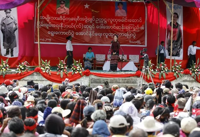 Myanmar pro-democracy leader Aung San Suu Kyi gives a speech as she campaigns for the upcoming general election, in Demoso, Kayah state September 10, 2015. (Photo by Soe Zeya Tun/Reuters)