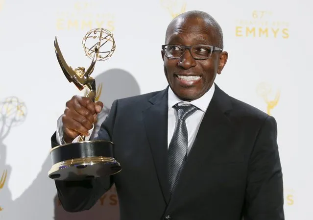 Musician Greg Phillinganes poses with his outstanding music direction award for “Stevie Wonder: Songs In The Key Of Life – An All-Star Grammy Salute” backstage at the 2015 Creative Arts Emmy Awards in Los Angeles, California September 12, 2015. (Photo by Danny Moloshok/Reuters)