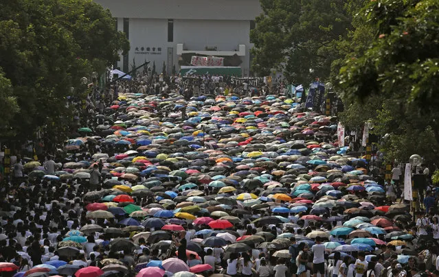 Students from various universities take part in a demonstration at the Chinese University in Hong Kong September 22, 2014. (Photo by Bobby Yip/Reuters)